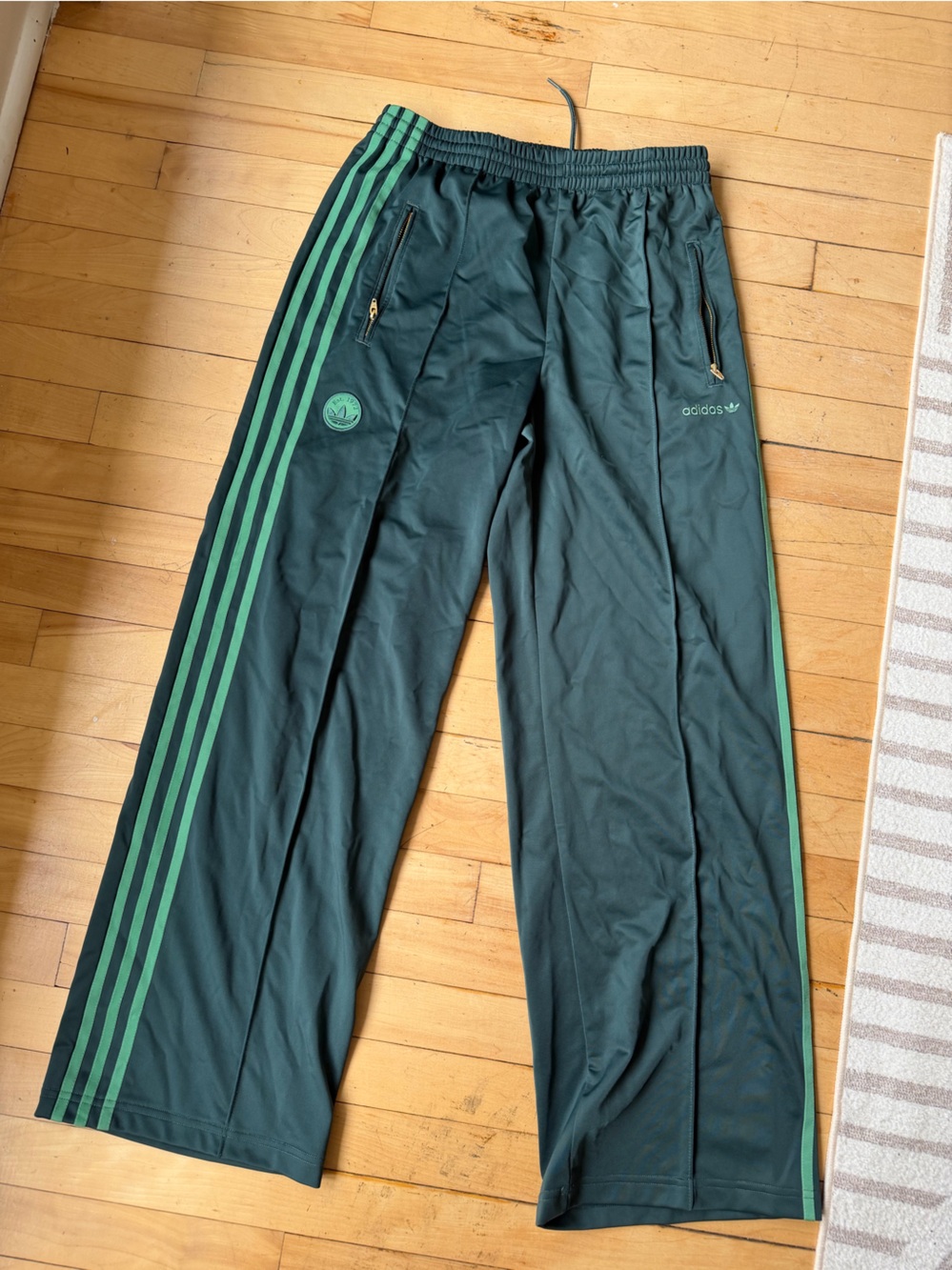 Adidas Green Track Pants with Signature Three Stripes